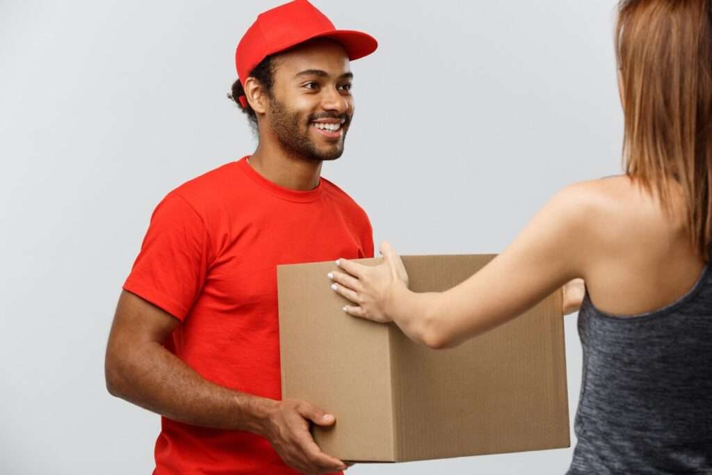 How To Optimize Routes With Google Maps - Optimize Routes With Google Maps - Delivery-Concept-Handsome-African-American-Delivery-Man-Giving-Package-Homeowner-Isolated-Grey-Studio-Background-Copy-Space_1258-1213