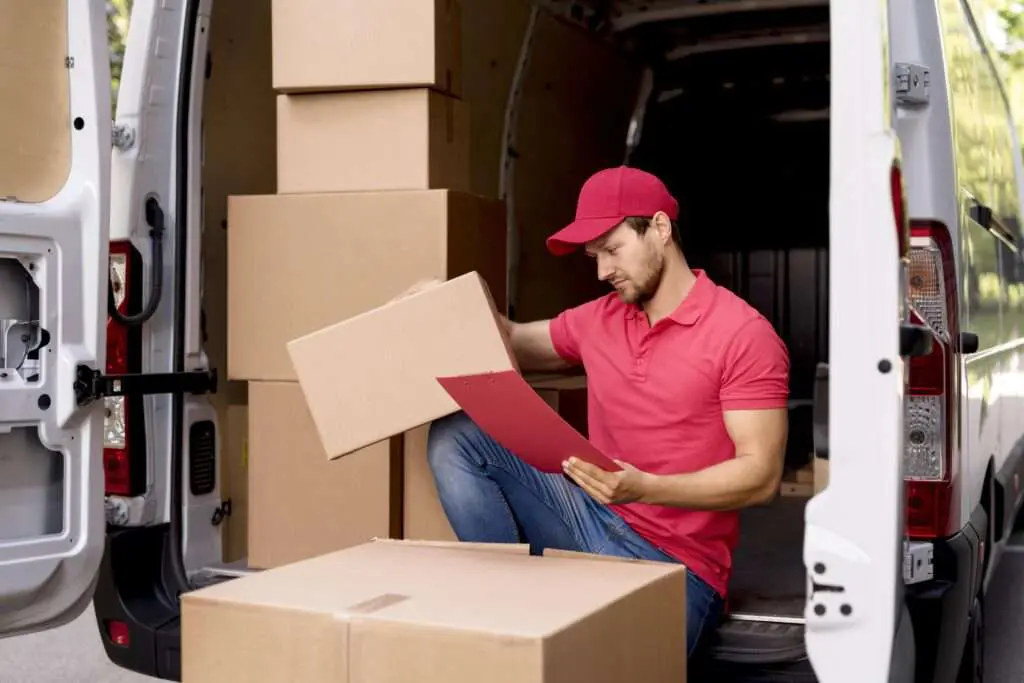 delivery guy checking the delivery list - efficient delivery planning