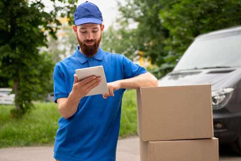 delivery guy in blue checking his route - multi stop route planning