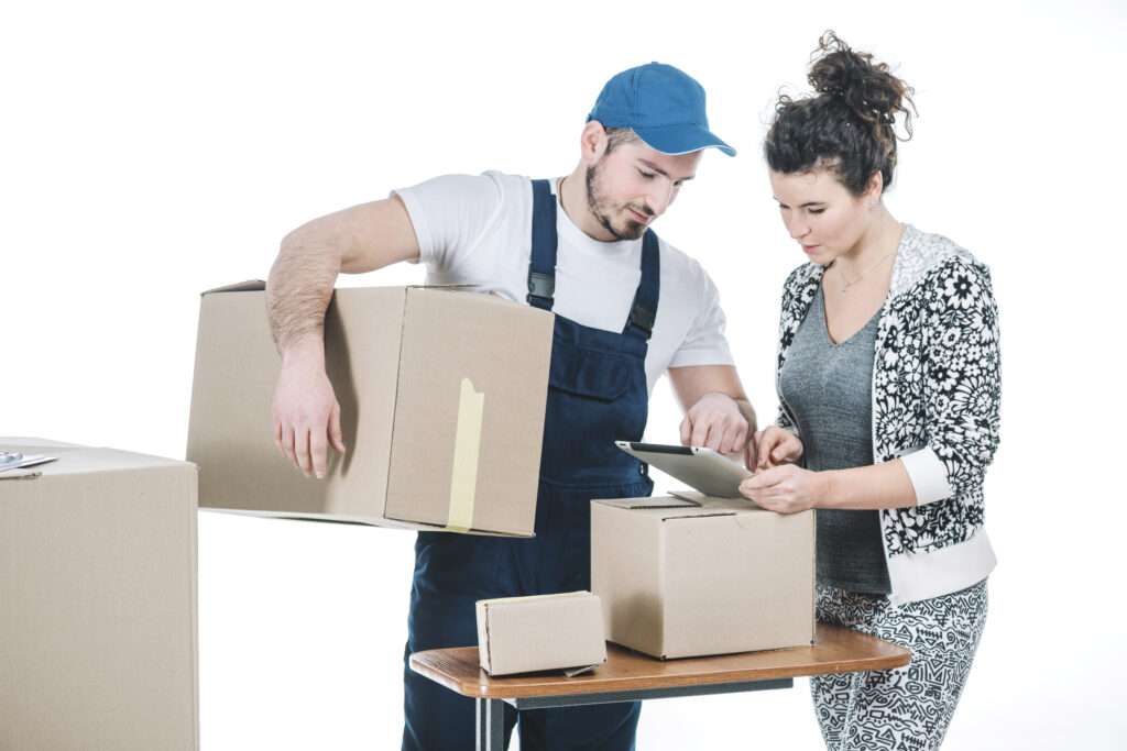 delivery guy explaining something to a woman - efficient delivery planning